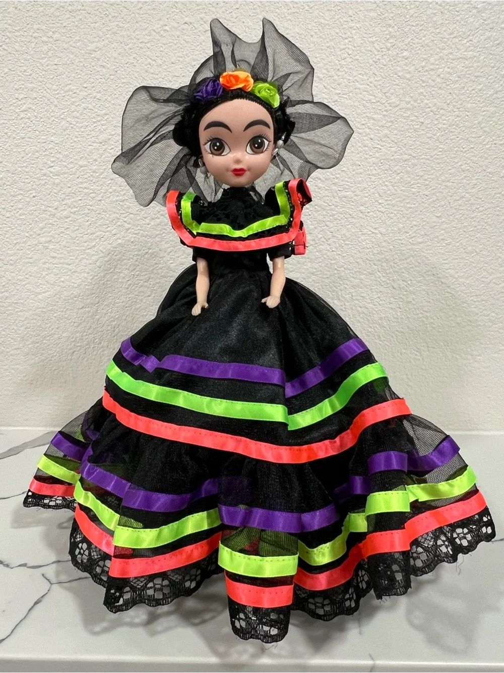 Black Decorative Doll with Neon Green, Purple & Red Trim